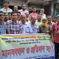 পাইকগাছায় বাঁকা বাজার উপস্বাস্থ্য কেন্দ্রের জমি দখলের পায়তারার প্রতিবাদে মানববন্ধন
